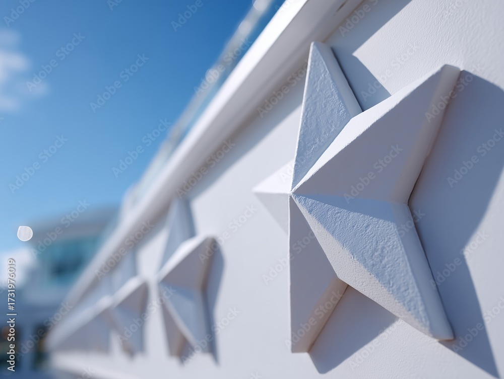 Fototapeta premium A close up of a white star on the side of a building