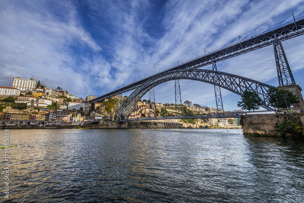 Fototapeta premium Dom Luis I Bridge and Porto city over Douro River seen from Vila Nova de Gaia city, Portugal
