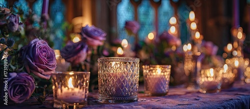 Purple candles and flowers romantic setting