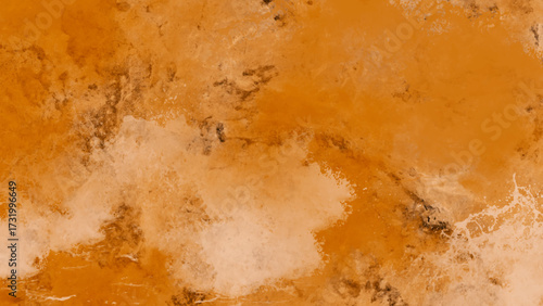 Abstract natural stone texture with deep ochrea and white veining for elegant decor.
