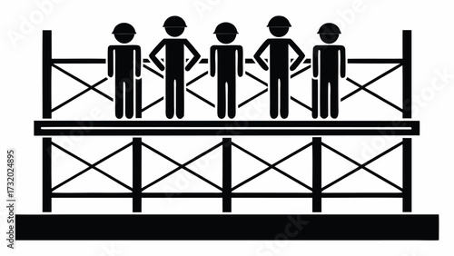 Team of construction workers standing together on a scaffold ready for their next project