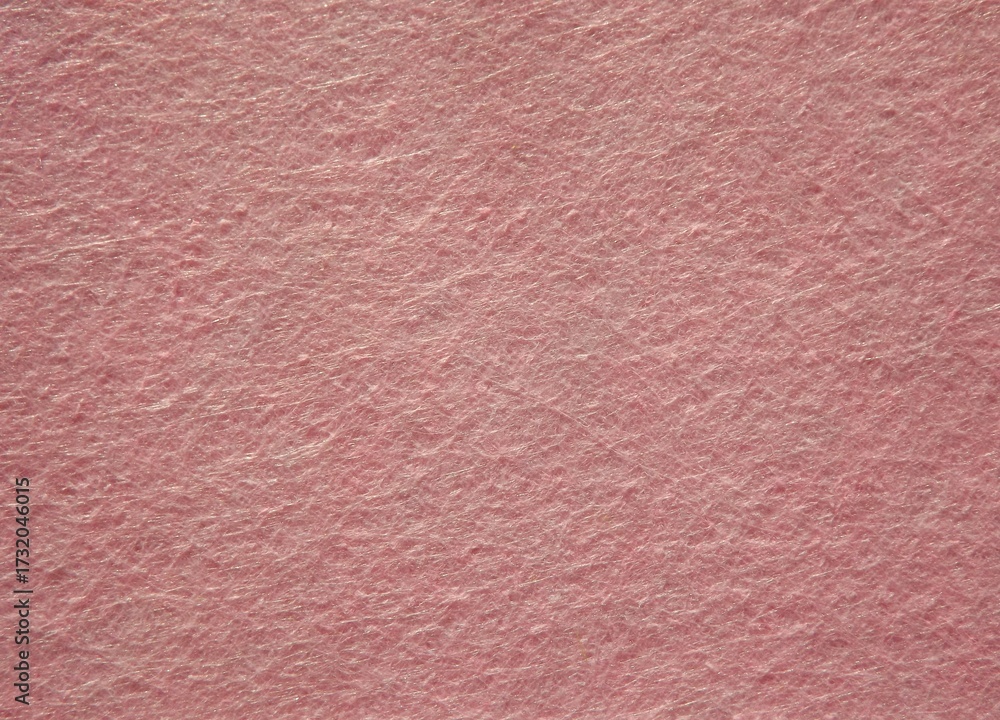 Fototapeta premium The textured surface is brown, red in color as a background. Felt. High quality photo