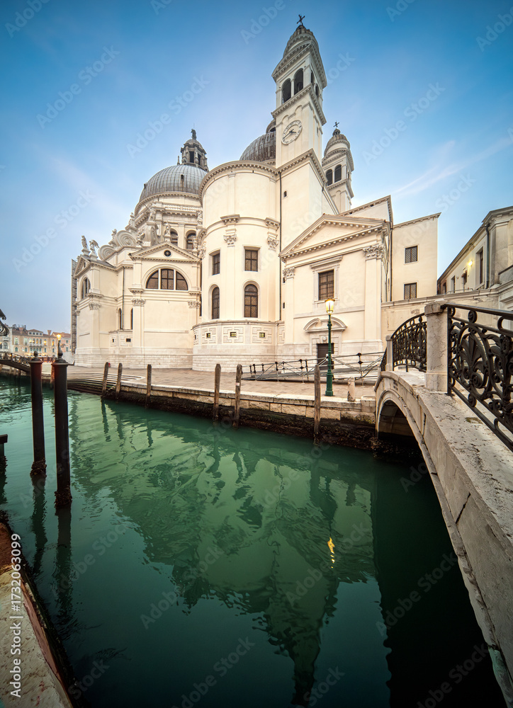 Fototapeta premium Santa Maria della Salute reflected in Rio della Salute in Venice