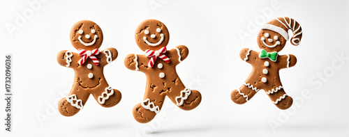 three smiling gingerbread m...