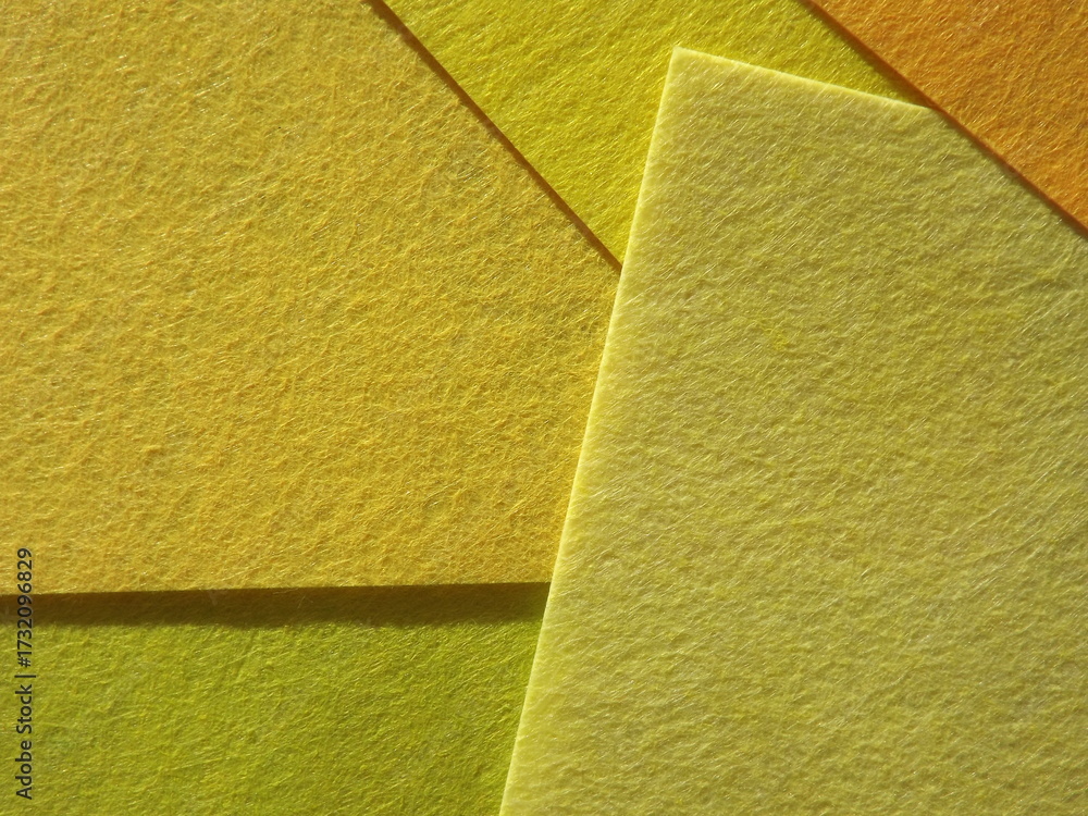 Fototapeta premium The textured surface is green, light green, pistachio color, herbal color as a background. Felt. High quality photo