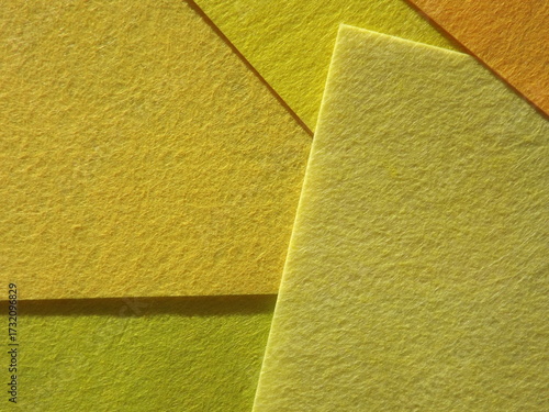 The textured surface is green, light green, pistachio color, herbal color as a background. Felt. High quality photo