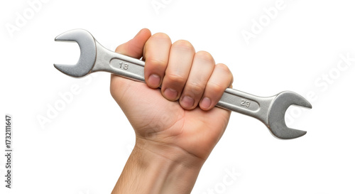 Isolated hand holding spanner wrench or repair tool for plumbing and engineering projects
