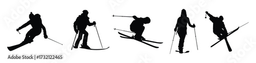 Silhouettes of Skiers in Action on White Background