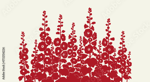 Red hollyhocks silhouette against a neutral backdrop
