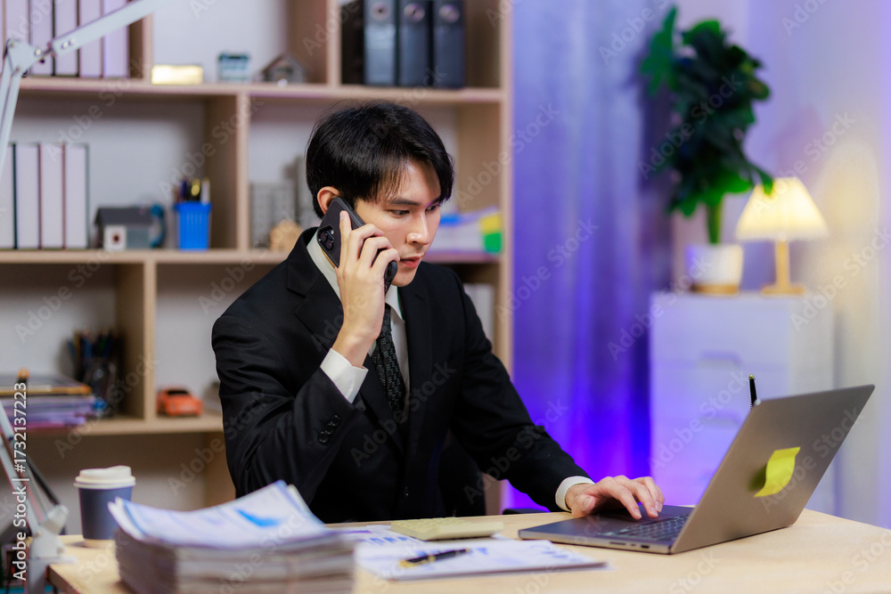Fototapeta premium Professional man on a call finalizing a business agreement.