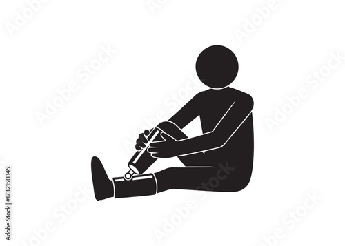 Person with bandaged knee sitting isolated on white background in silhouette.