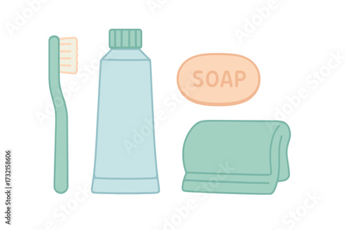 Collection of bathroom hygiene essentials including toothbrush, toothpaste, bar of soap, and folded towel