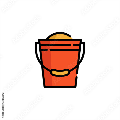 Orange bucket filled with sand sitting on white surface, creating a simple and playful scene, perfect for summer vacation vibes.