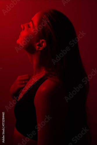 Siluette women Portrait with long hair in red color
