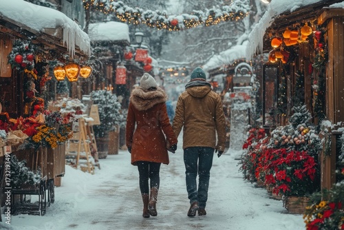 Couple walking through snowy street.