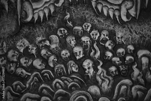 Tormented faces dominate horror art macabre illustration, gothic style. dark fantasy surreal image conveys intense despair emotion. Monochrome drawing shows unsettling figures an eerie background