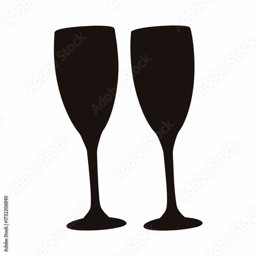 Two elegant black champagne flutes standing side by side on white background