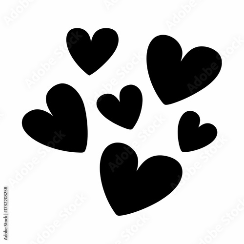 Group of various sized black hearts scattered randomly on a white background