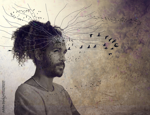 Creative concept of a man with abstract lines and birds emerging from his head