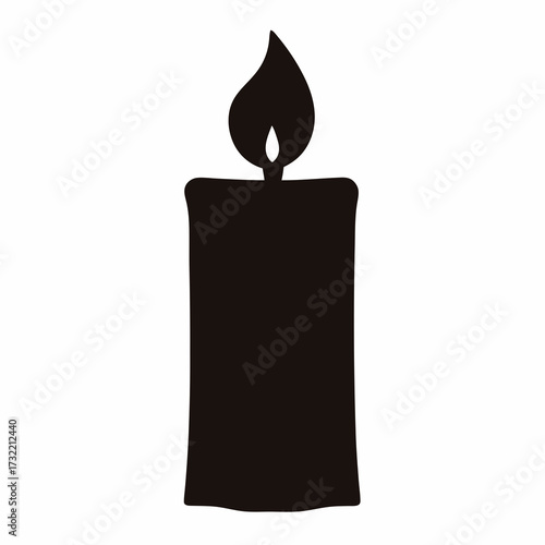 A solitary black candle with a flickering flame casting light around it