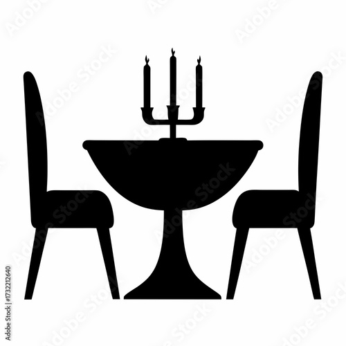Elegant dining arrangement with a round table, chairs, and candle holder