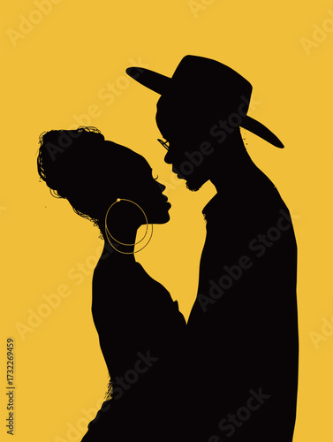 A couple stands close, sharing an intimate moment as their silhouettes contrast sharply with a vivid yellow backdrop under soft evening light.