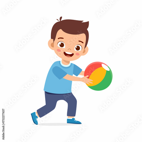 A cheerful young boy in a blue t-shirt happily plays with a colorful striped ball, ready for a game