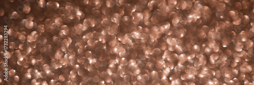 Mocha Mousse, brown sparkling glitter bokeh background banner, abstract defocused texture header. Holiday lights.