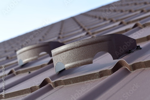 Brown metal roof with snow stopper bracket
