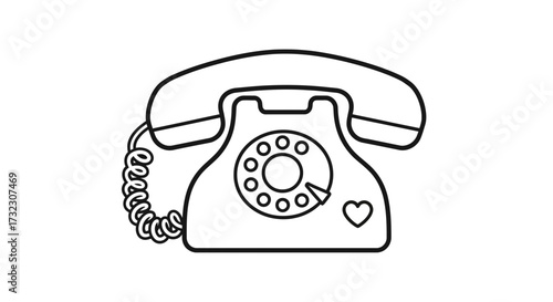 Vintage charm: A rotary dial phone with a heart, evoking nostalgia and connection