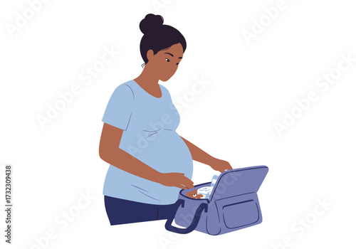 A pregnant woman with a bun is packing a blue bag