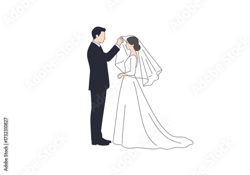 Groom adjusting brides veil both in formal attire