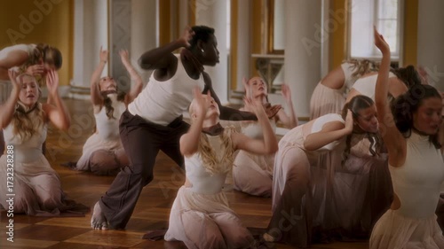 Modern Dance Execution With Graceful Fluidity In A Classical Hall