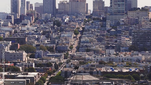 Wallpaper Mural Aerial view of San Francisco's grid like streets, colorful buildings, and greenery, with Salesforce Tower and downtown skyscrapers in the background. Torontodigital.ca