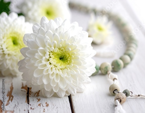Wallpaper Mural Close-up of white chrysanthemum flowers and rosary beads on a distressed wooden surface Torontodigital.ca