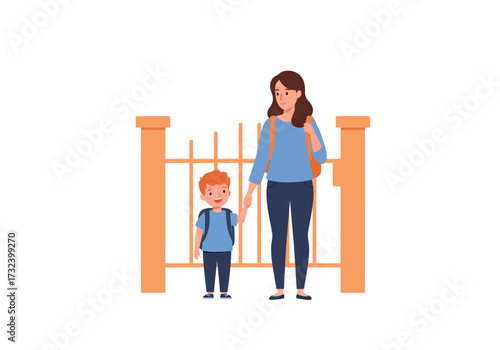 A woman walks a young boy to school a school gate visible behind them