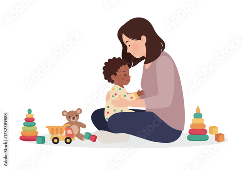 Woman holds child sitting among toys with a loving gaze