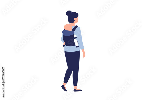 Woman with bun walks carrying a baby in a dark blue carrier on her back wearing matching pants and shirt