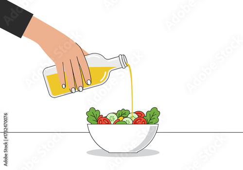 Pouring olive onto fresh salad kitchen table food preparation minimalistic style top-down view healthy eating