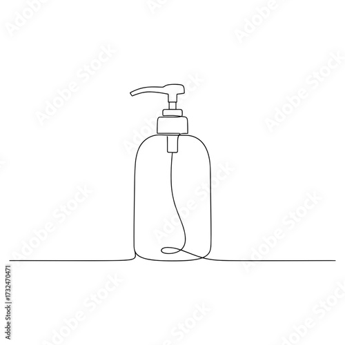 Automatic soap dispenser on bathroom counter, hygienic touchless device in clean restroom.