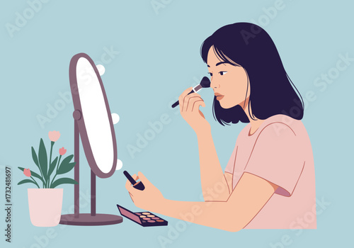 Makeup application by a woman home vanity digital personal space beauty routine