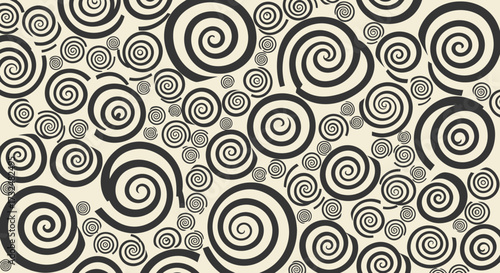 Swirling pattern of black spirals on a cream background