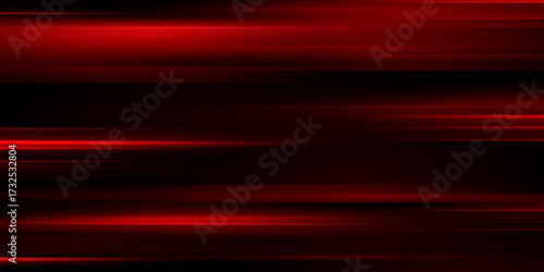 The effect of red light in fast motion on a black background. blurred abstract background with long exposure. neon light
