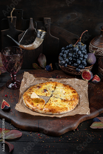 Meat Khachapuri – Georgian Bread with Savory Filling. Traditional Georgian Bread. Traditional Georgian cuisine styled with authentic atmosphere.