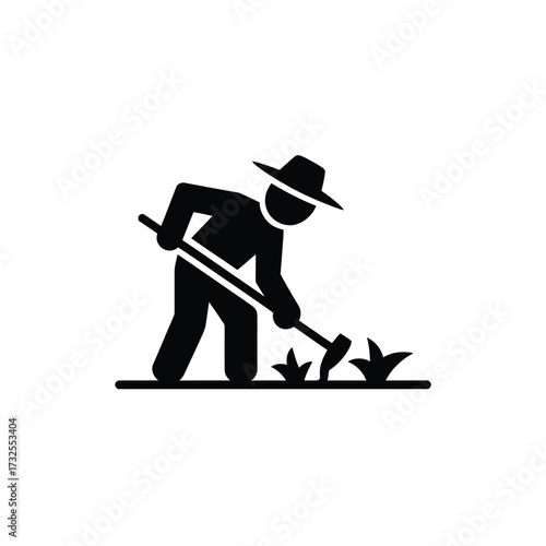 Farmer working in field with hoe icon
