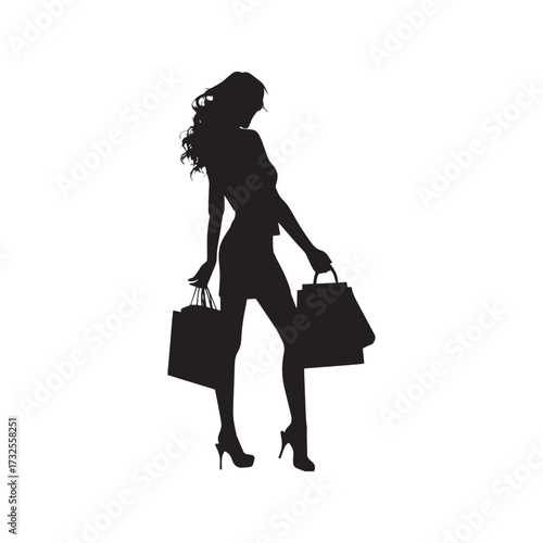 silhouette of woman with shopping bags