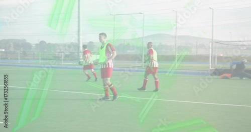 hockey forwards dribbling ball into circle bypassing defender, keeper diving, players probing lanes