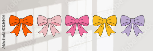 This image showcases a delightful collection of colorful bows in various shades, perfect for artistic projects and enhancing creativity in design.