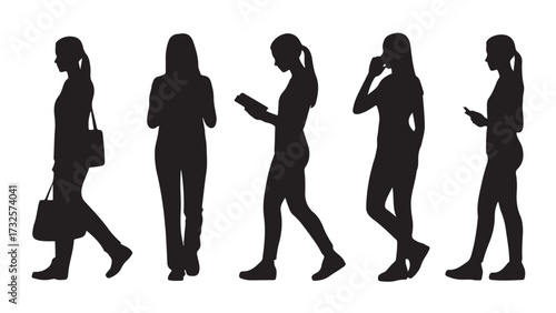 Set of female silhouette figures using mobile devices vector illustration of women walking and interacting with technology isolated on white background