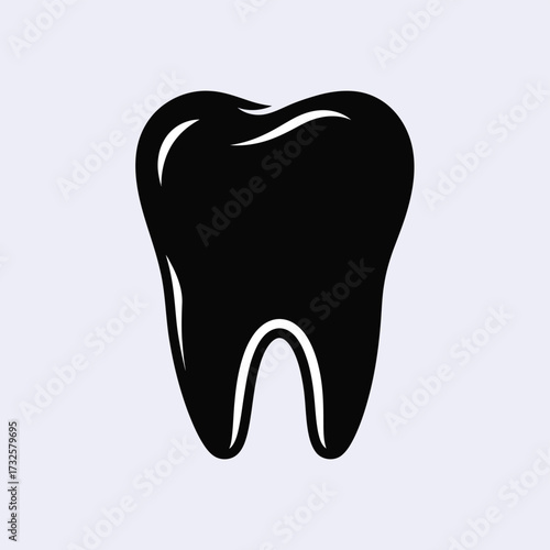 A striking black tooth shape against a light background silhouette